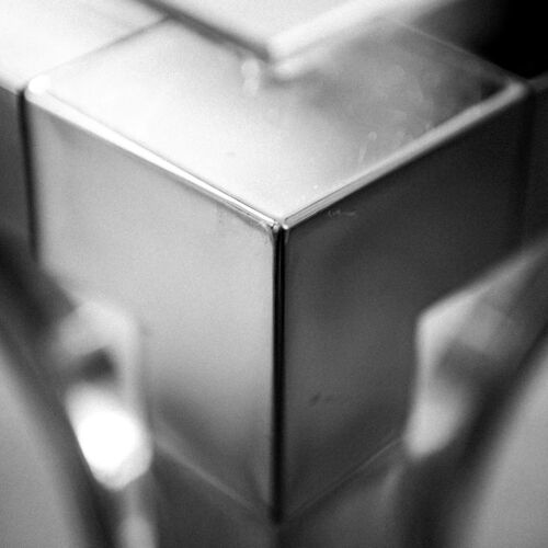 Sleek and minimalist design of a metallic cube